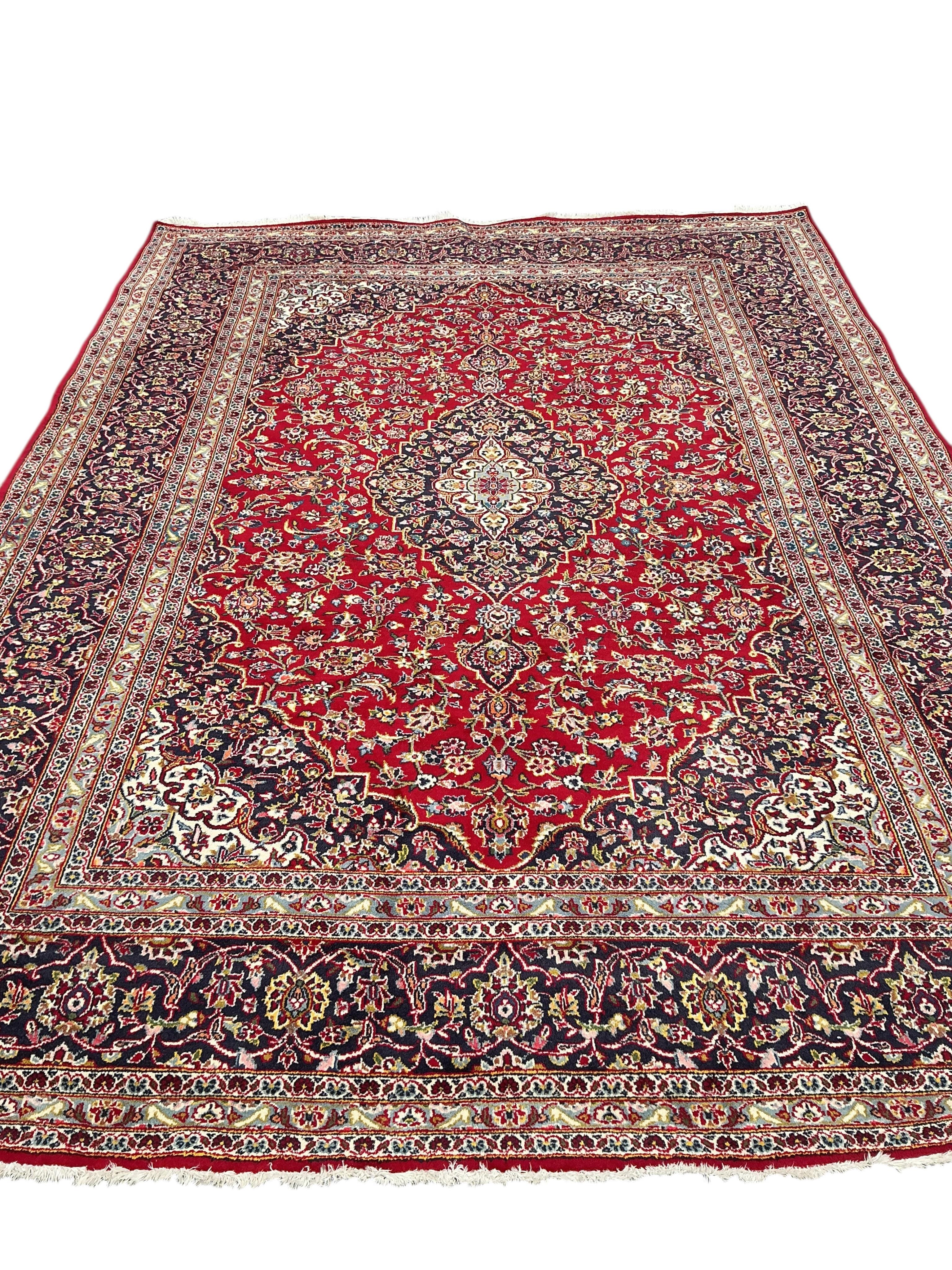 A Nadjafabad blue ground carpet, 346 x 248cm